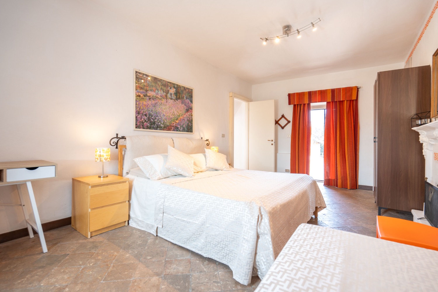 Wooden bed with bedding