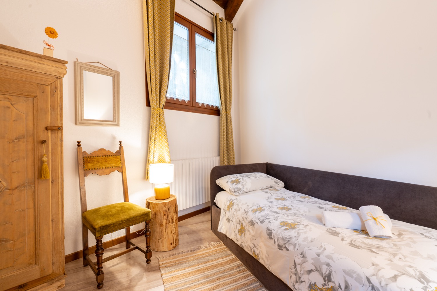 Wooden bedroom with furniture