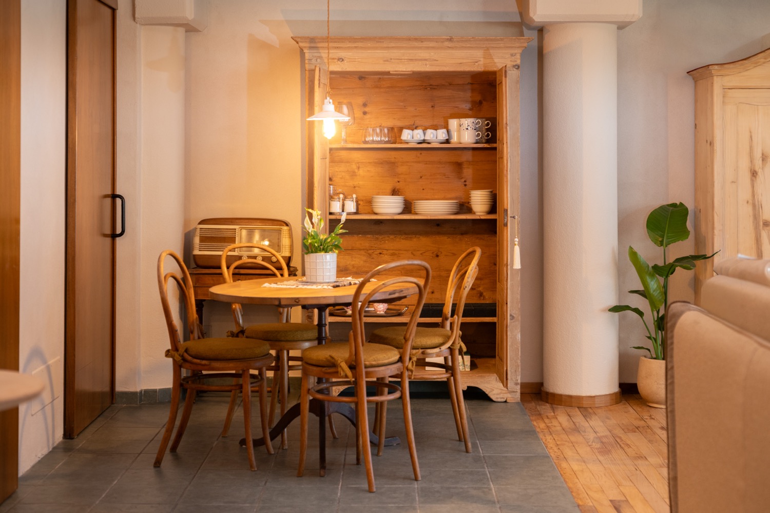 Wooden dining room table and cabinet