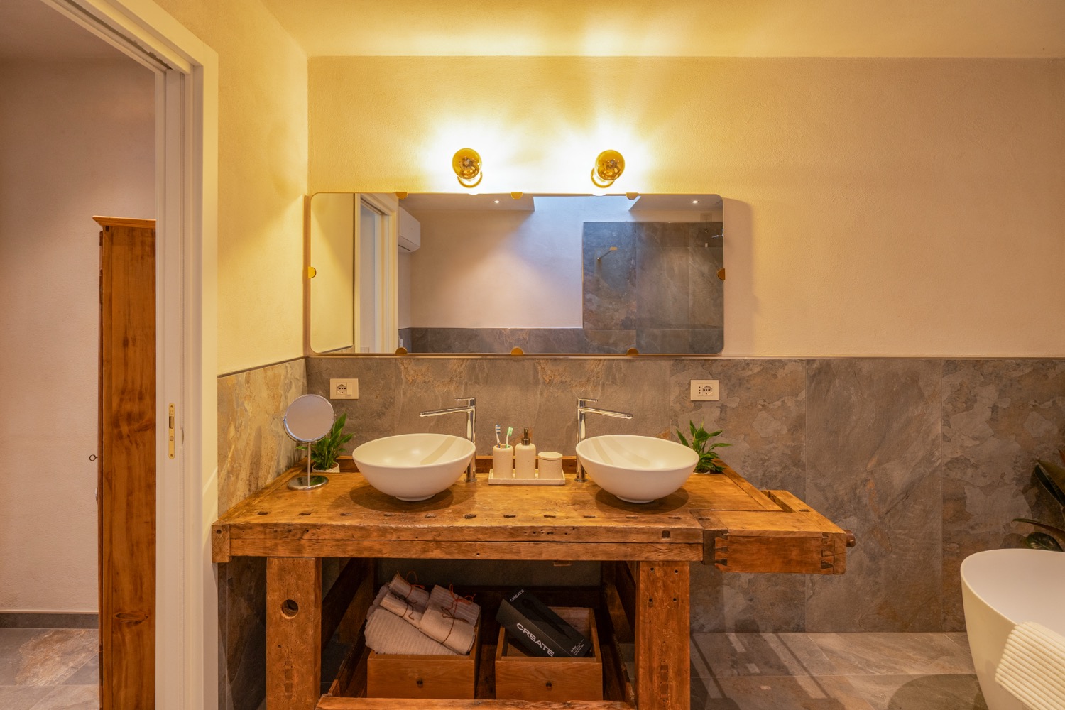 Wooden bathroom interior with furniture and washbasin