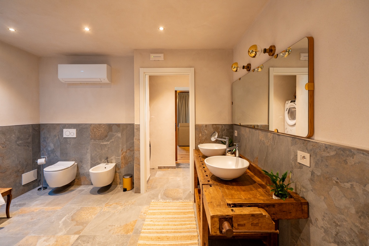 Wooden bathroom interior with door and seat