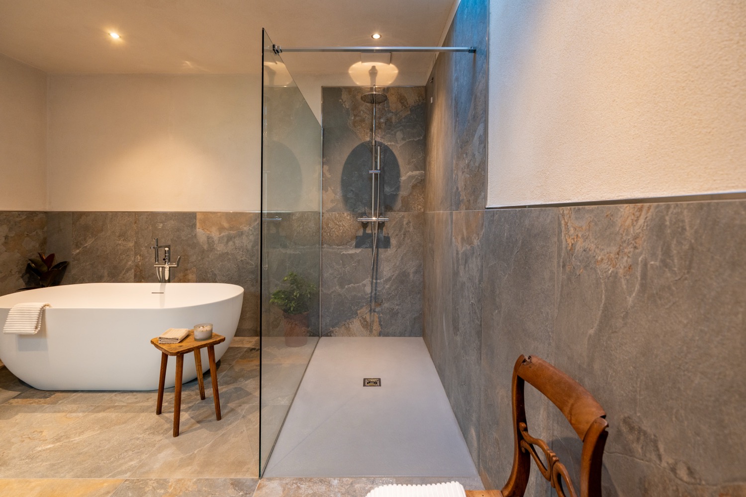 Bathroom interior with glass shower and washbasin