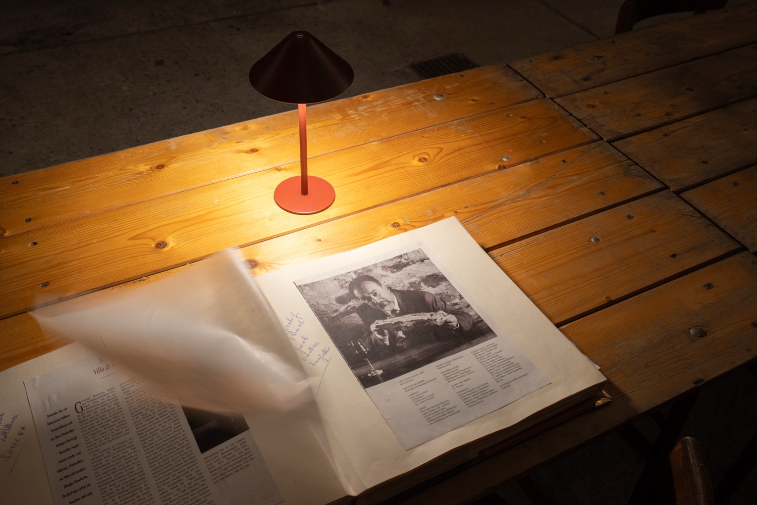 Wooden table with light and lamp