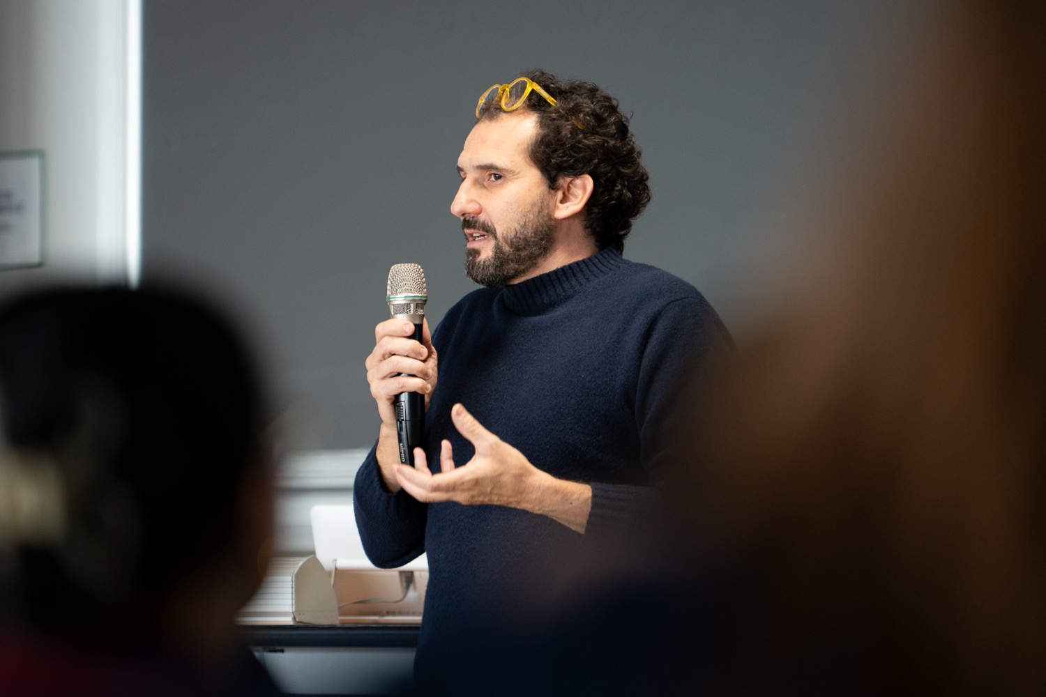 Person talking into microphone