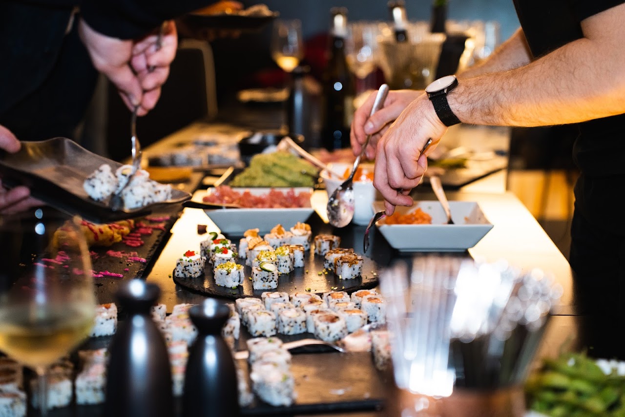 Sushi on a table with utensils