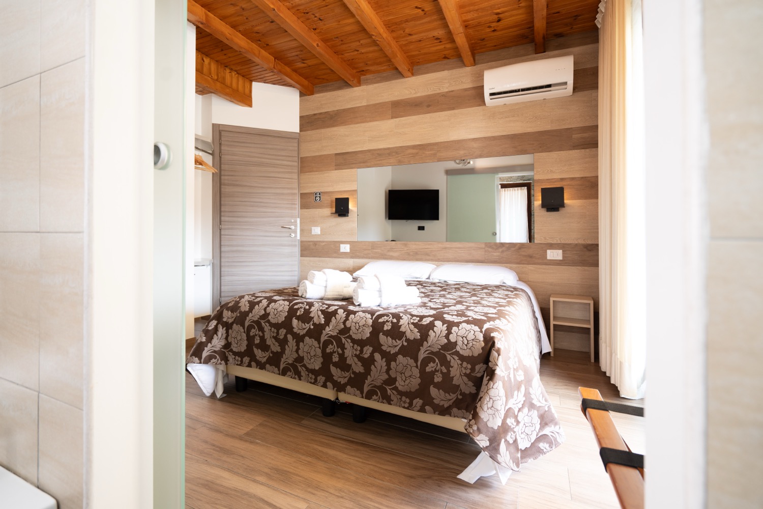 Wooden room with bed